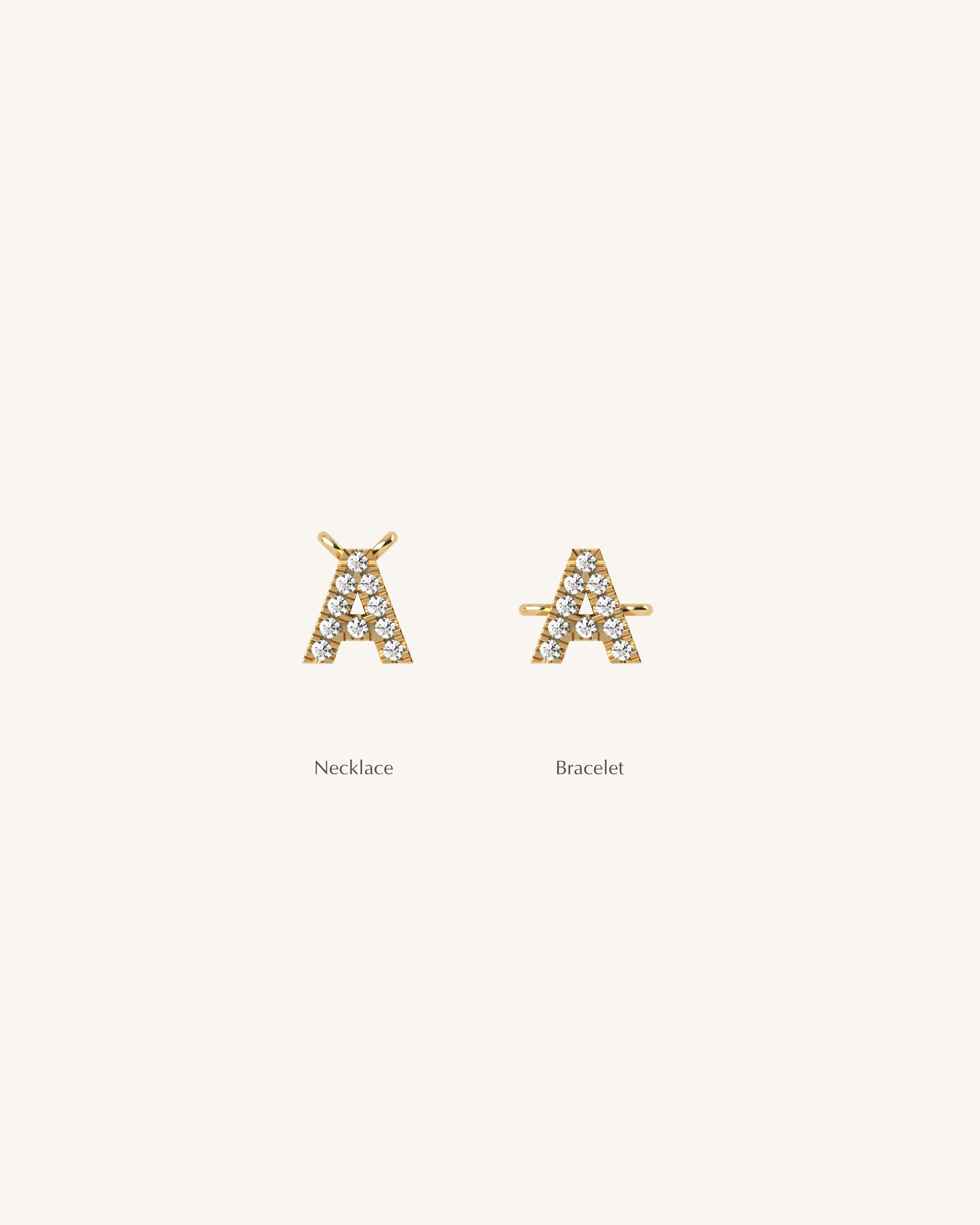 Two gold letter 'A' necklaces on a white background