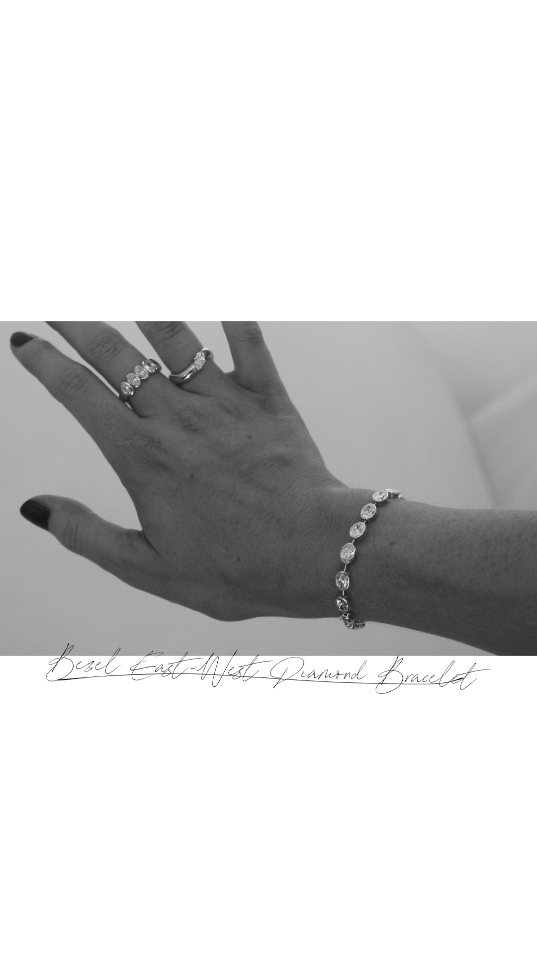 A hand adorned with a diamond ring and a bezel-set diamond bracelet, showcasing luxury jewellery. Black nail polish complements the elegant look.