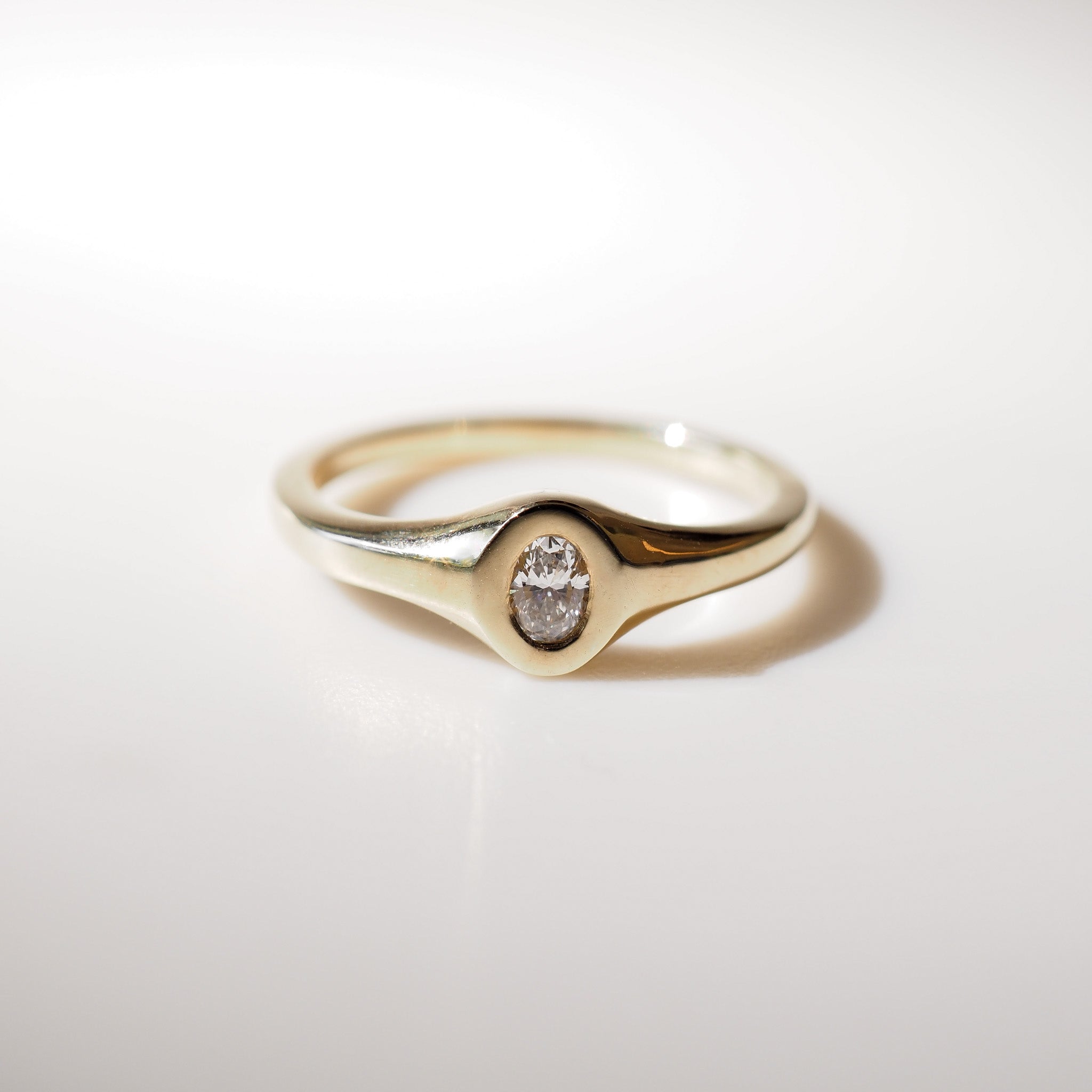 Yellow Gold Oval signet with diamond set