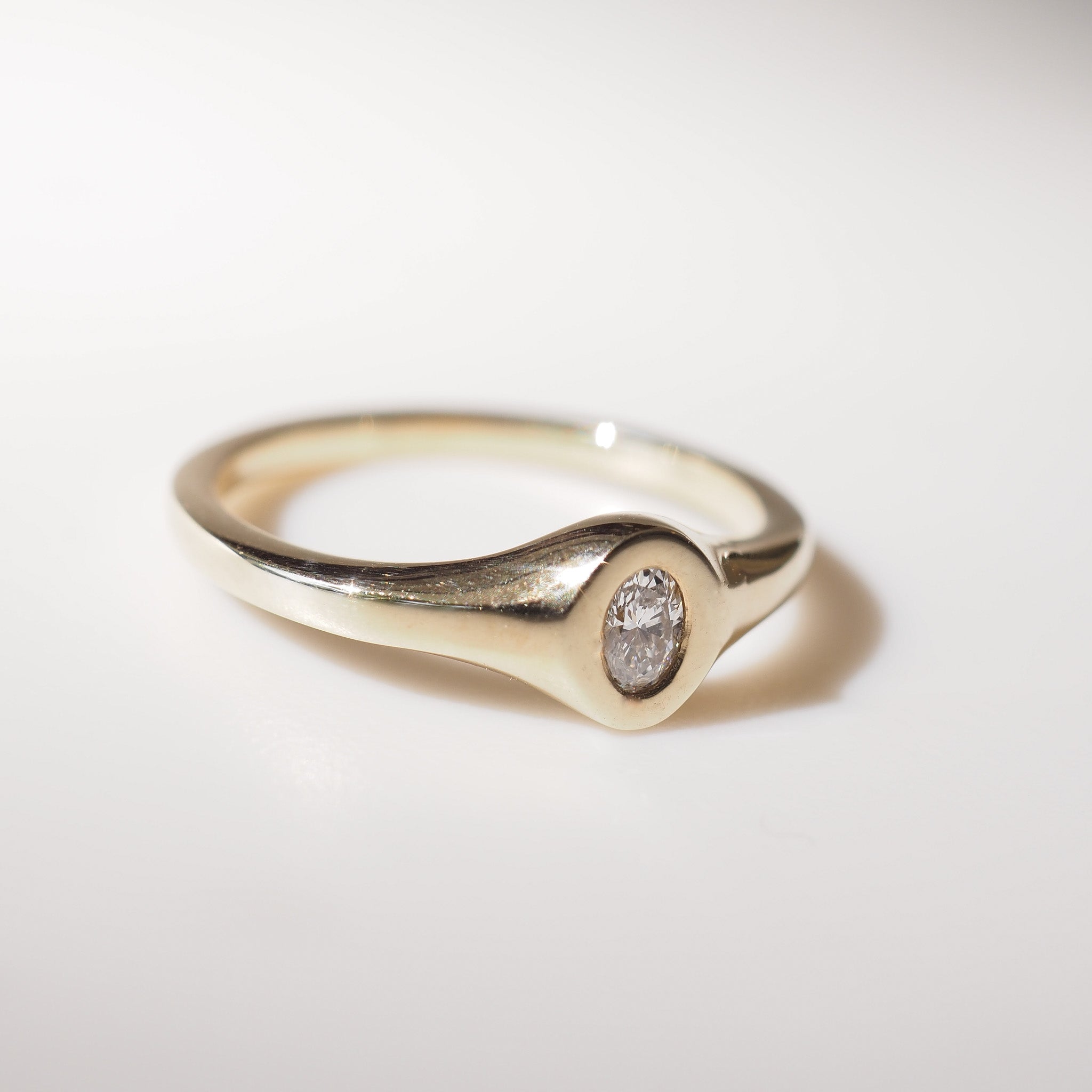 Yellow Gold Oval signet with diamond set