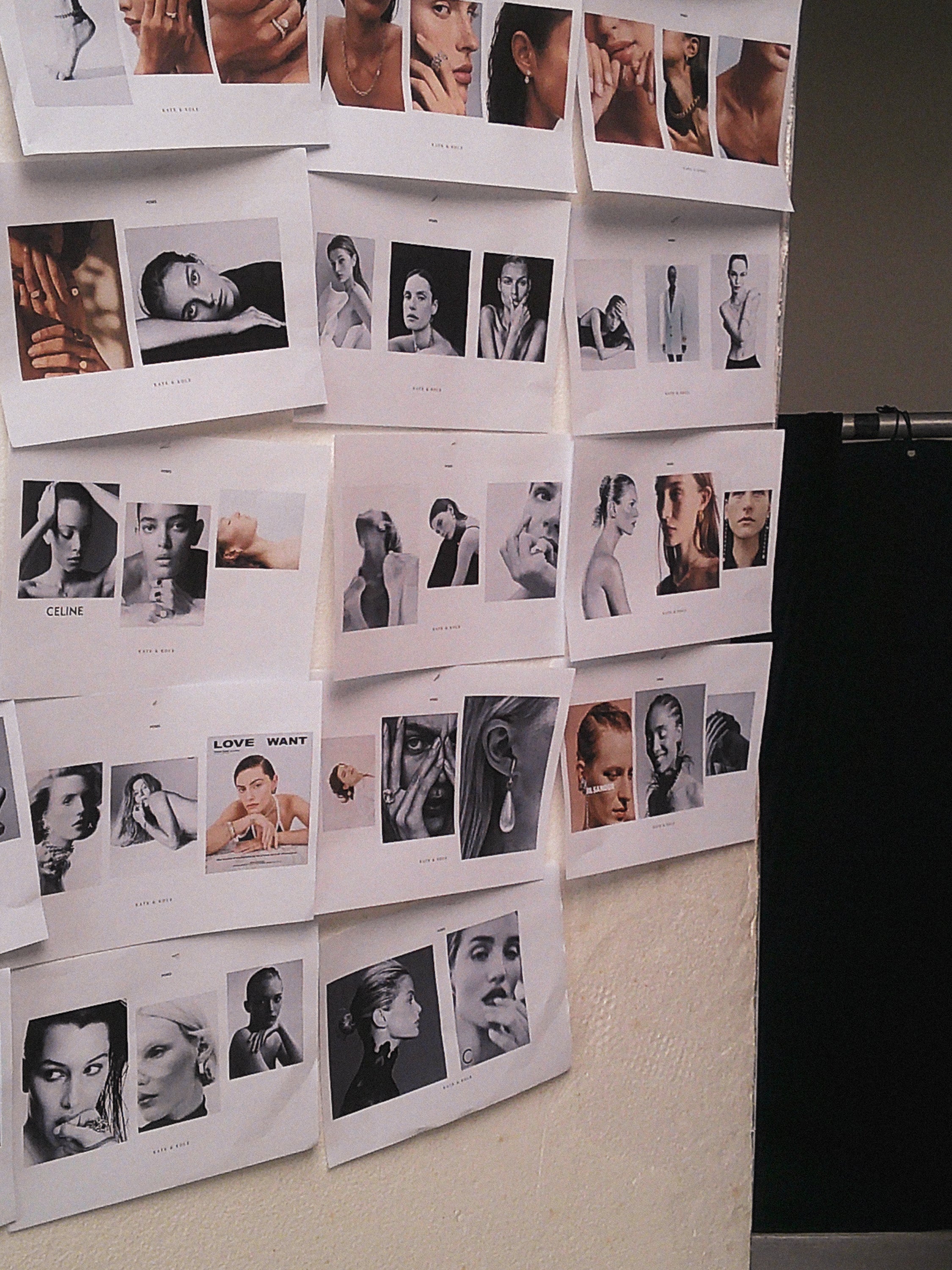 Collage of printed fashion and jewellery model photos on a wall, featuring luxury earrings, necklaces, and high-end fashion accessories.