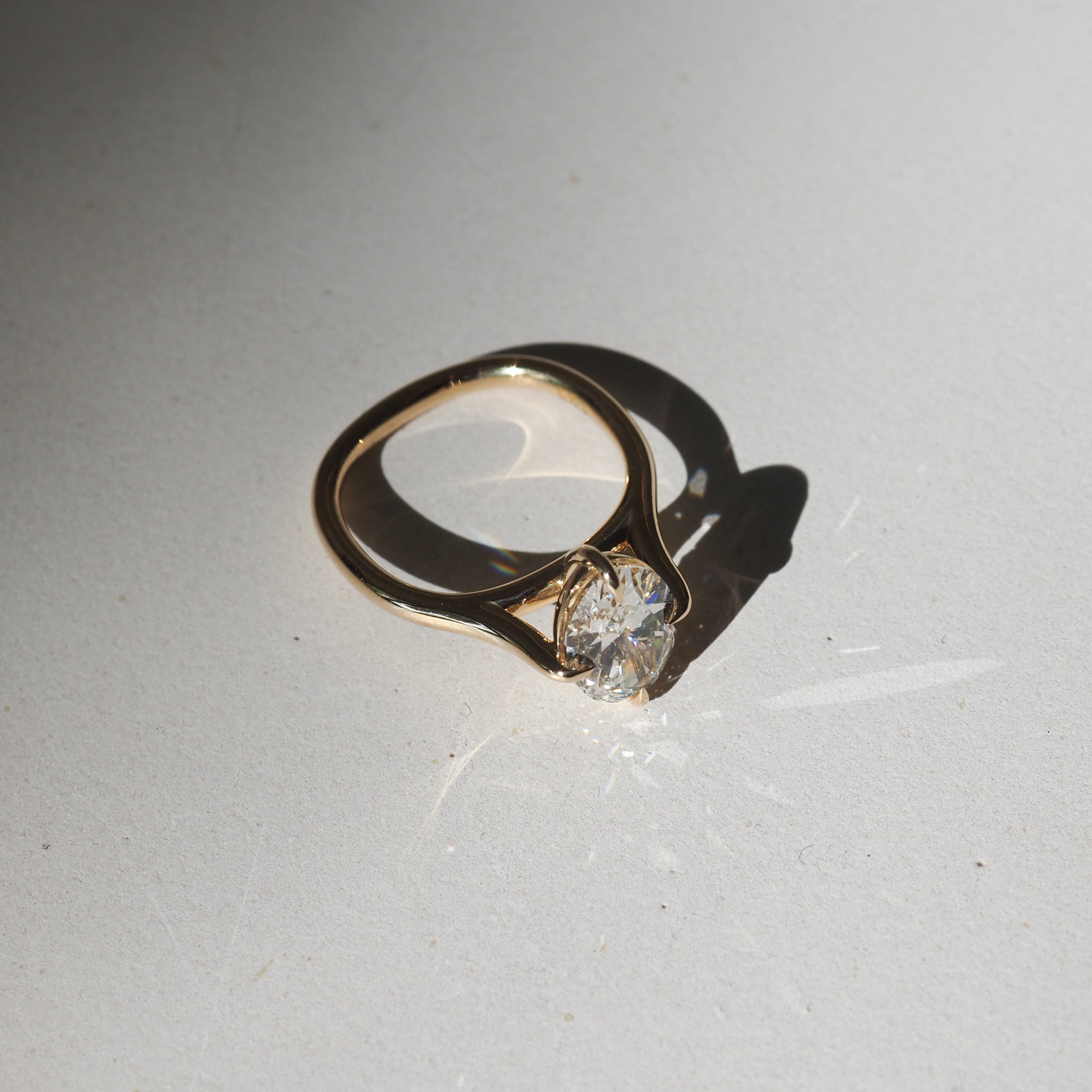 Oval cathedral on sale engagement ring