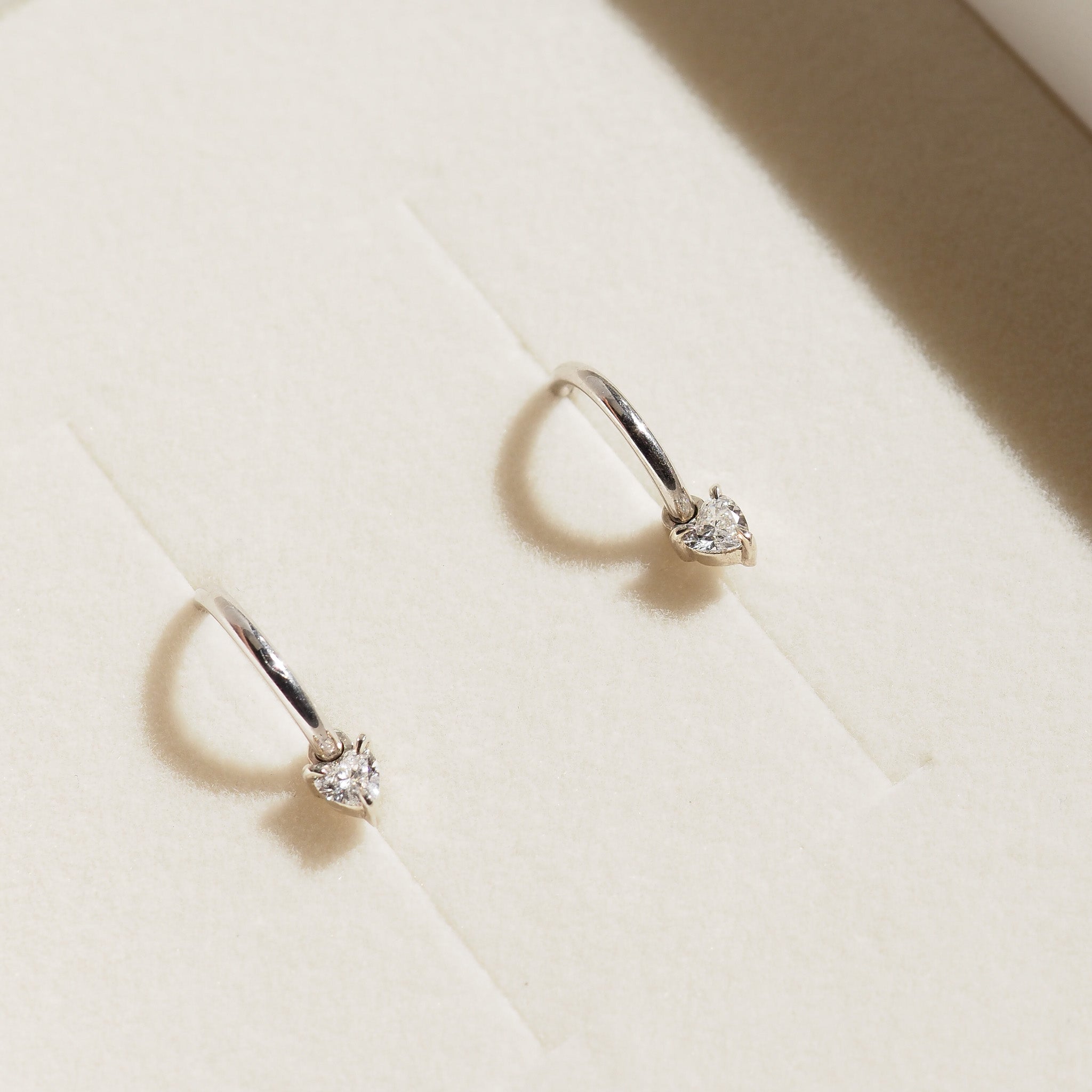 Heart charm earrings in box