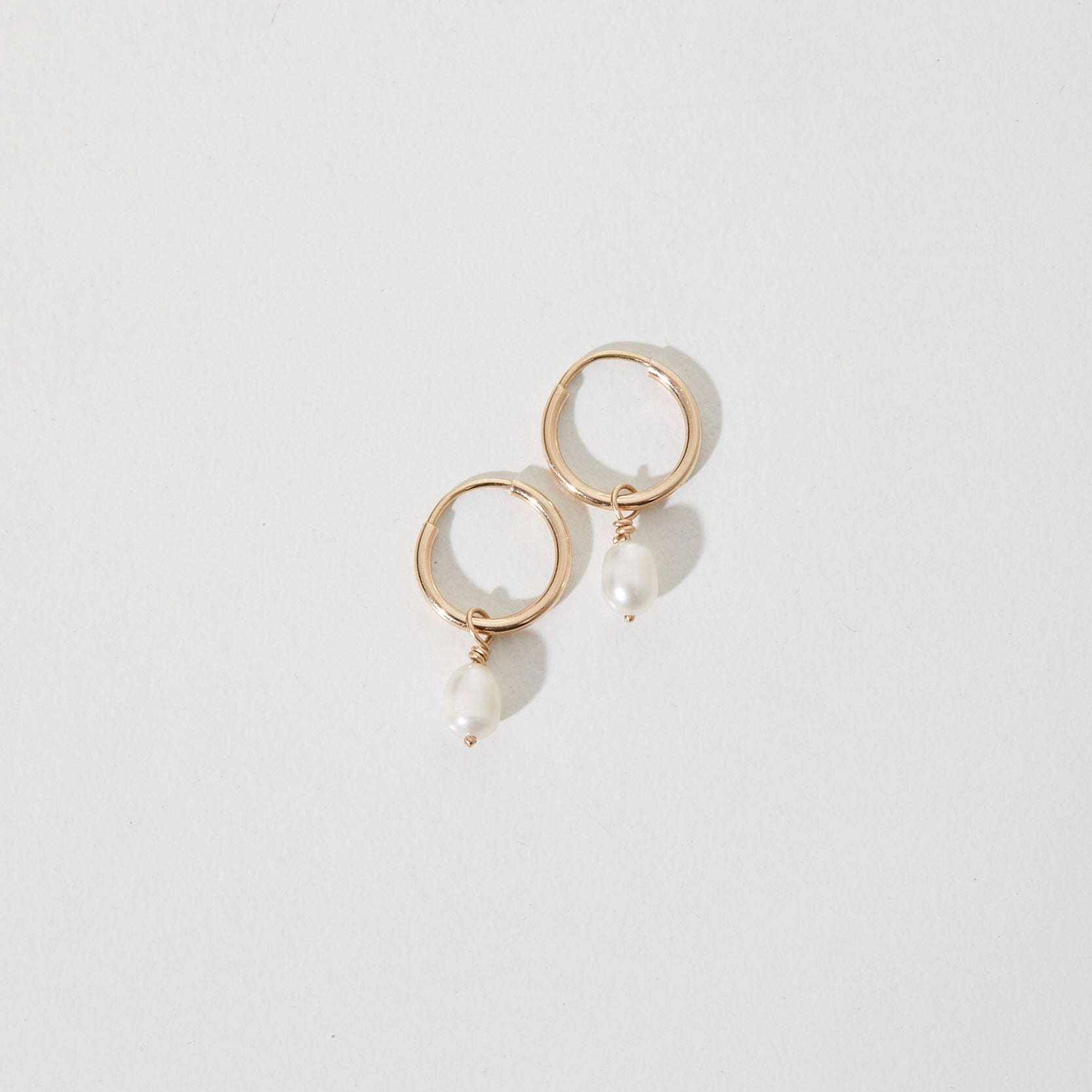 Tiny Pearl Hoops