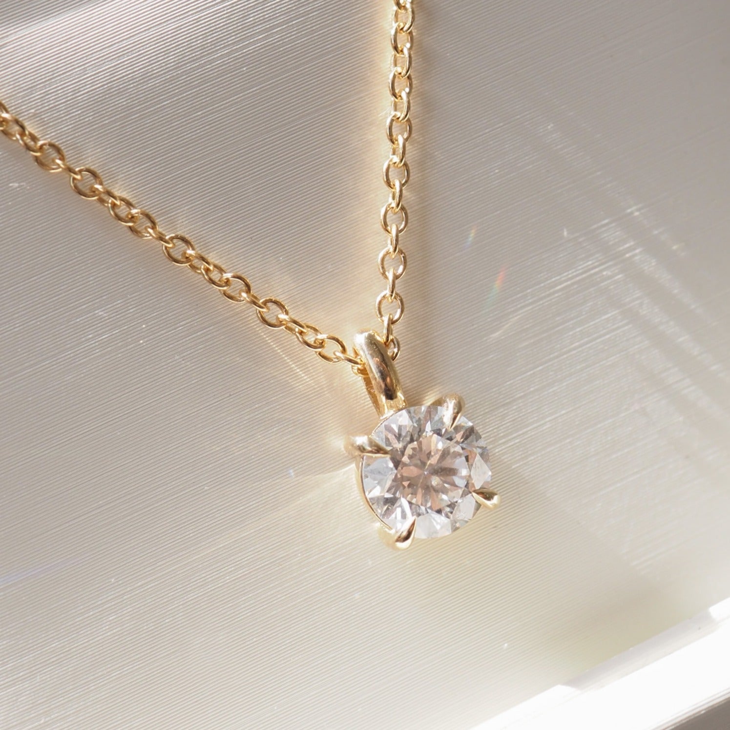 Round Brilliant Pendant on a Gold Chain