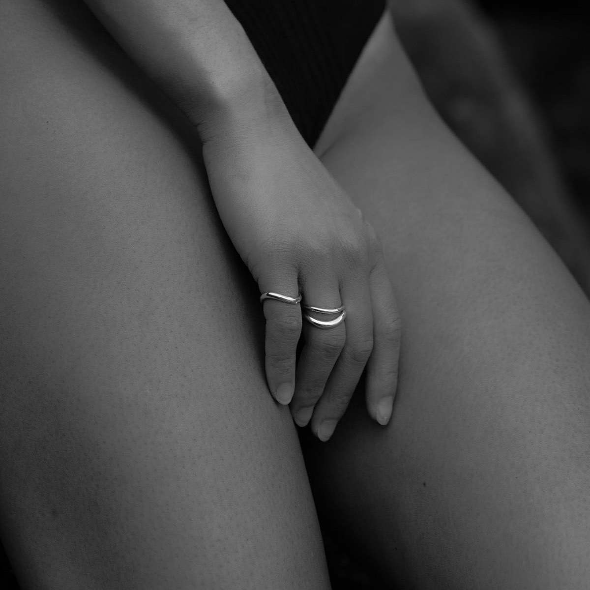 Model wears stacked Awa Wave Wedding Band Ring in Solid 9ct Gold Fine Medium Bold