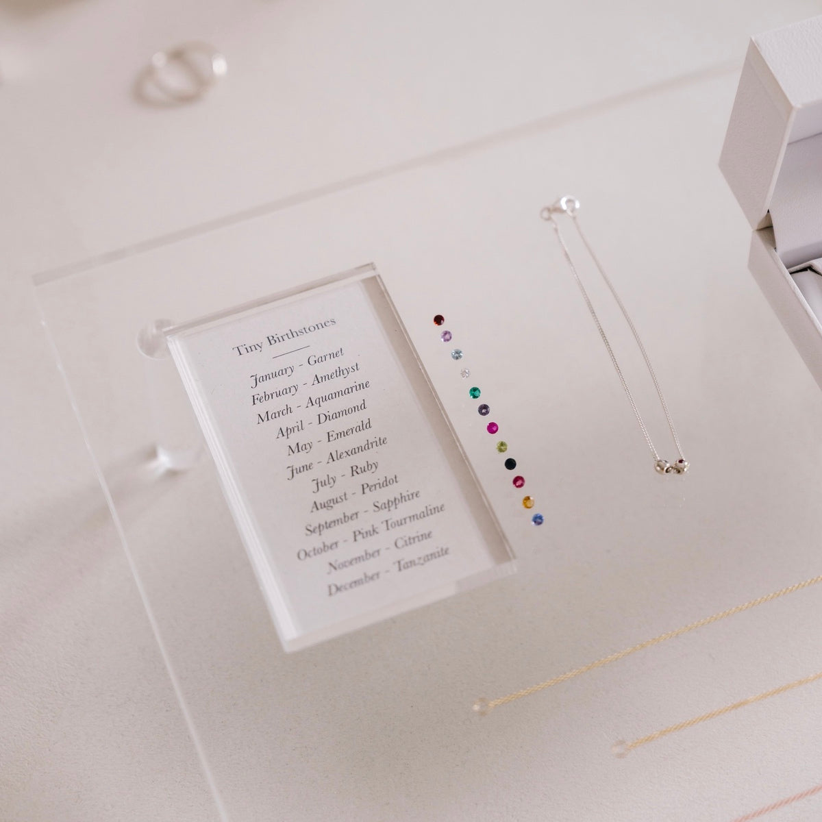 A selection of our 12 birthstones to pick from to personalise our birthstone necklace