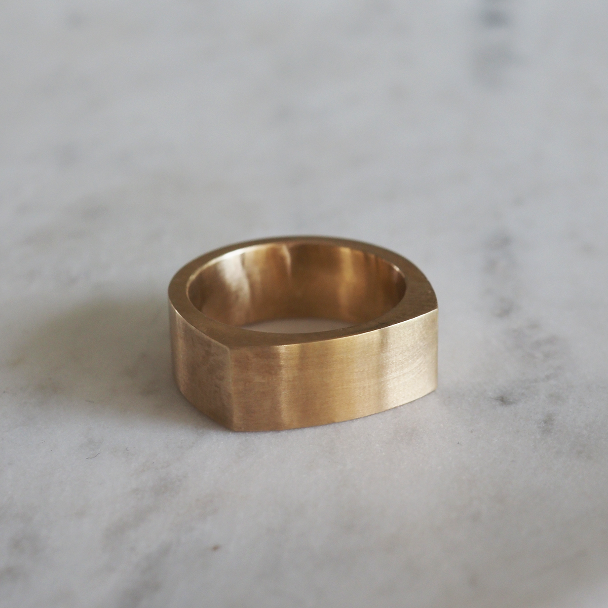 A modern flat top wedding band, designed for comfort and simplicity in 9ct yellow gold 