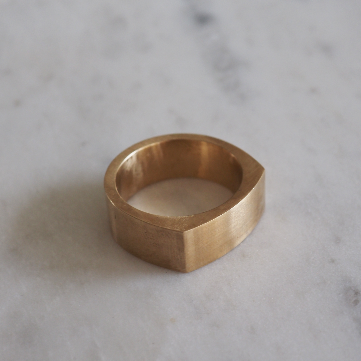 A modern flat top wedding band, designed for comfort and simplicity in 9ct yellow gold 