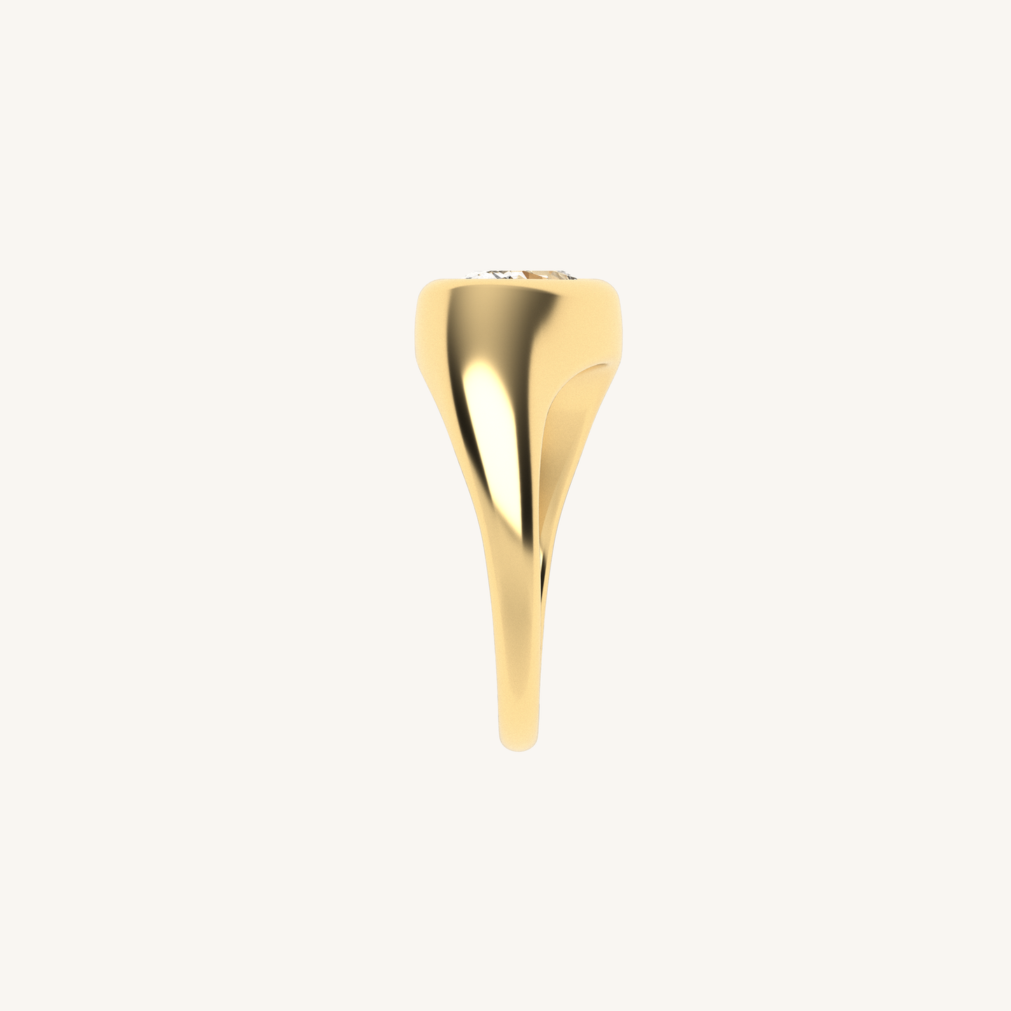 Gold ring with a diamond on a light beige background