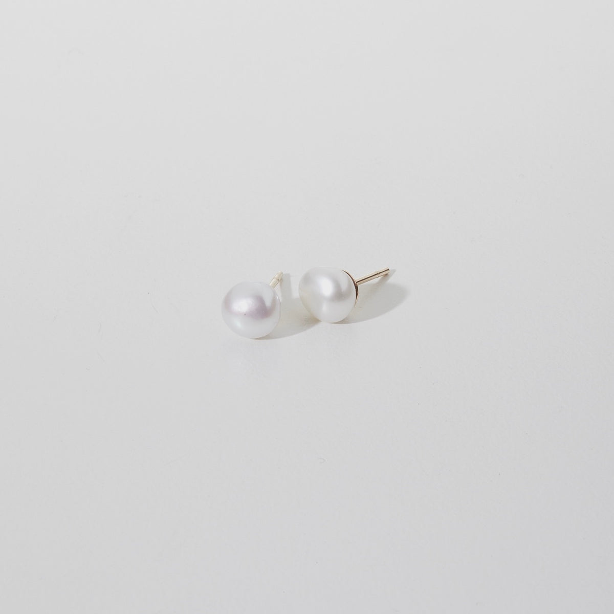Our high quality, hand finished Small Baroque Pearl Studs in 9ct yellow gold