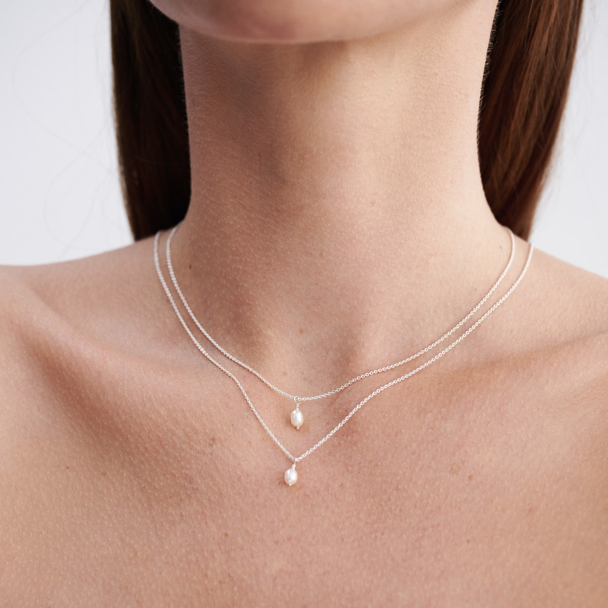 Model layers a 40cm and 45cm Solid sterling silver Hand Wrapped Baroque Pearl Necklace