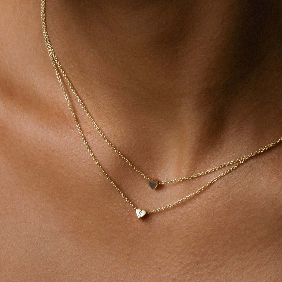 Solid Yellow, Rose & White Gold Heart Charm Necklace: High quality hand-finished jewellery layered on neck