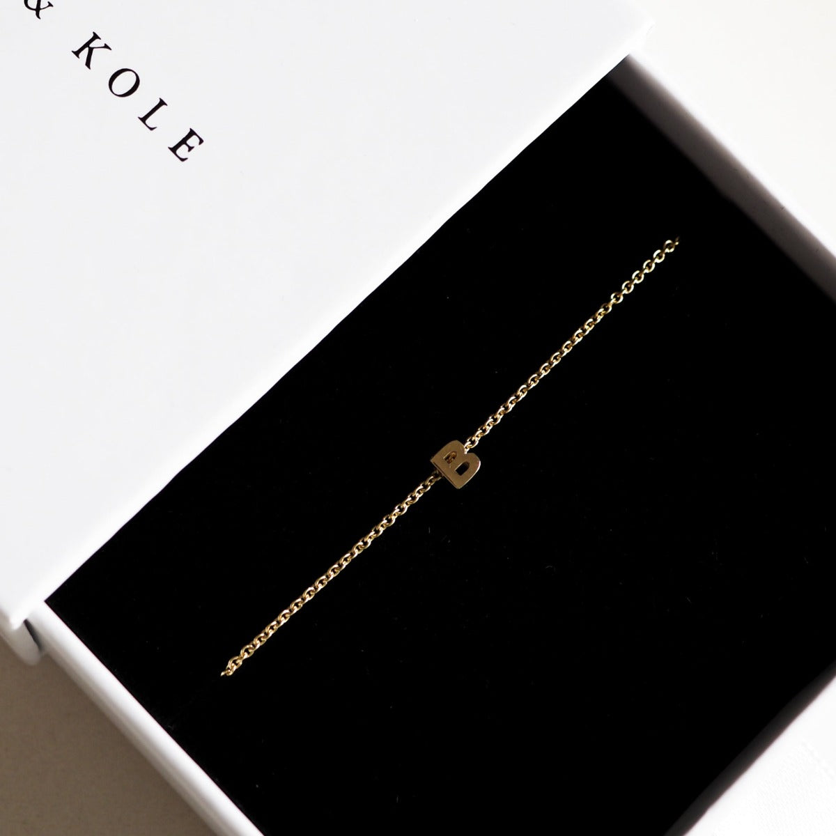Solid Gold and Silver Jewellery: Tiny Letter B Initial Bracelet in jewellery box