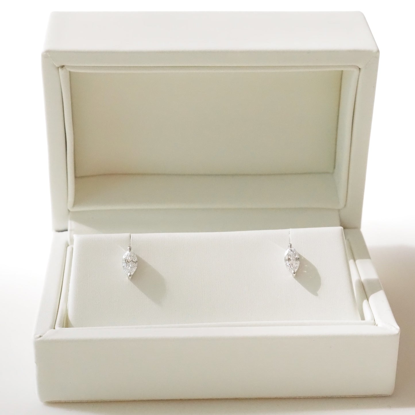 Pair of marquise earrings in a white jewelry box