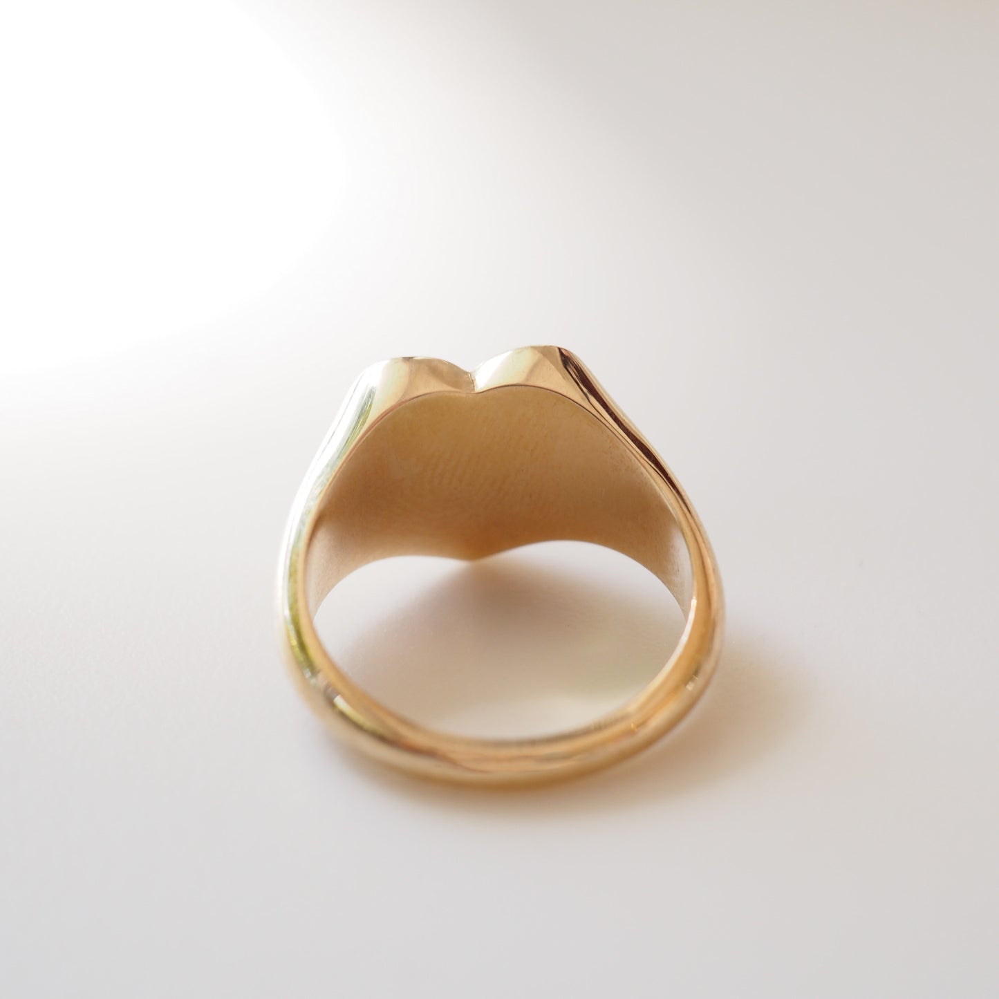Gold ring on a white background