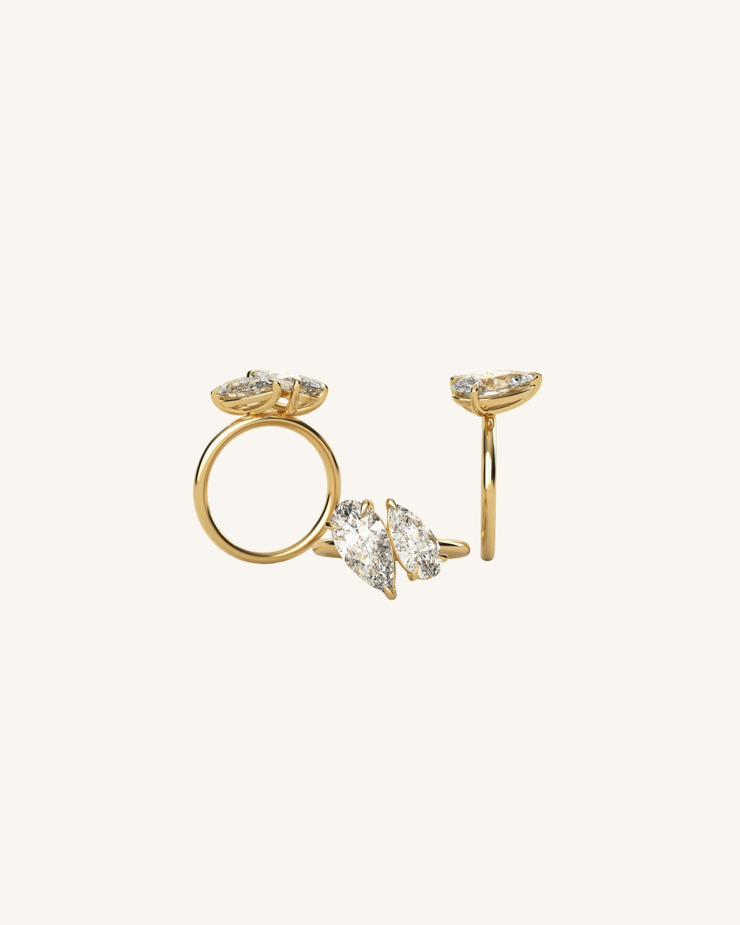 Elongated Pear Diamond Ring on a beige background