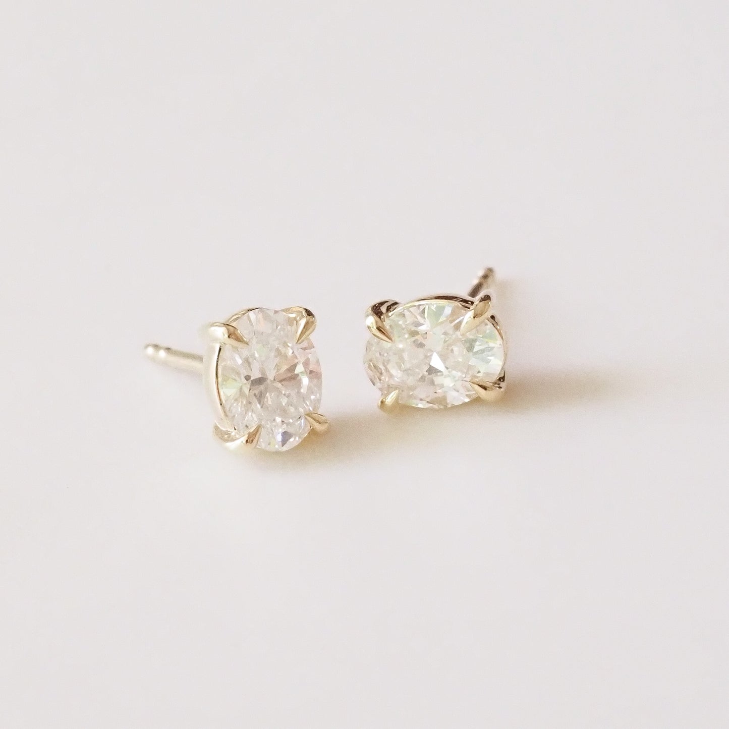Oval Diamond Studs on a white backdrop