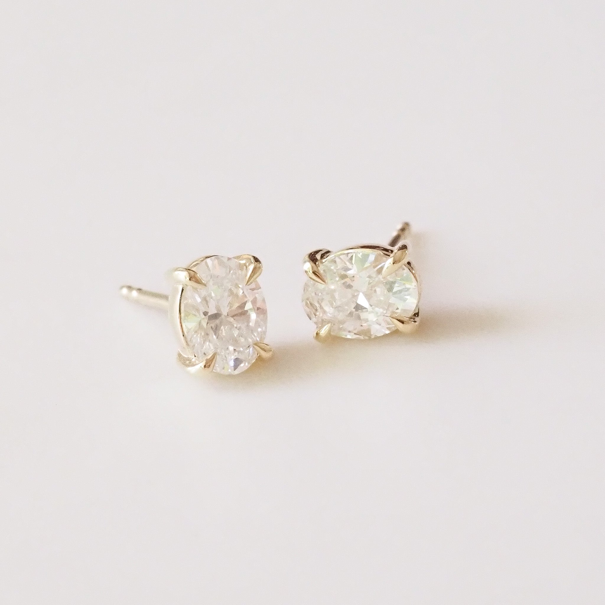 Oval Diamond Studs on a white backdrop