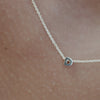 Solid gold and sterling silver jewellery: Video of a model wearing our signature sterling silver tiny letter D charm necklace on a 40cm cable chain