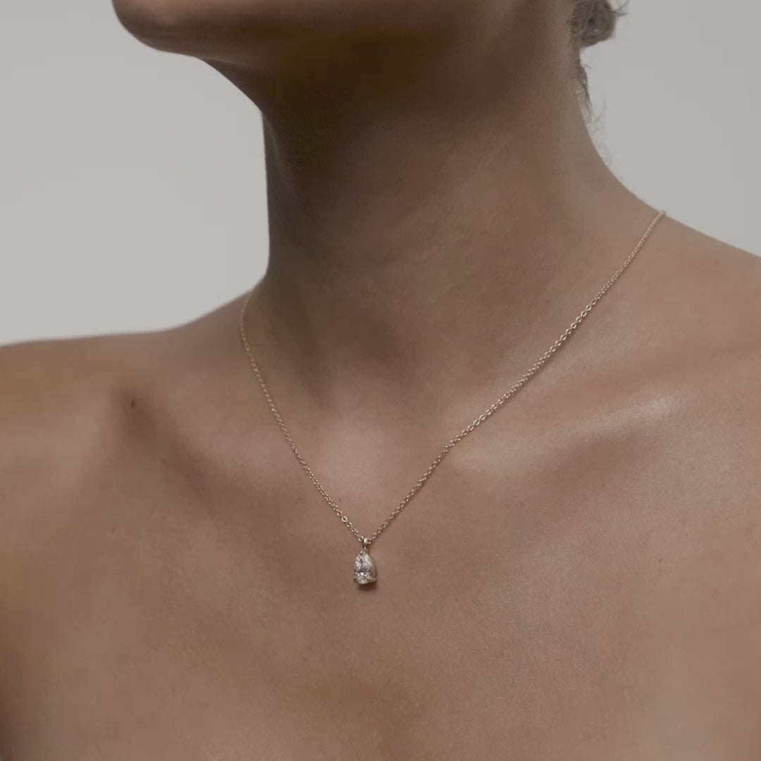 Pear Pendant on a yellow gold chain on model