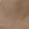 Video of a model wearing our beautiful Diamond Heart Charm Necklace in 9ct yellow gold, with a 40cm diamond curb chain