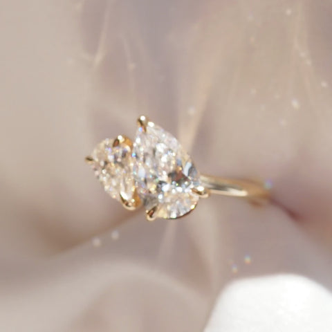 Duet Pear twirling in pink material