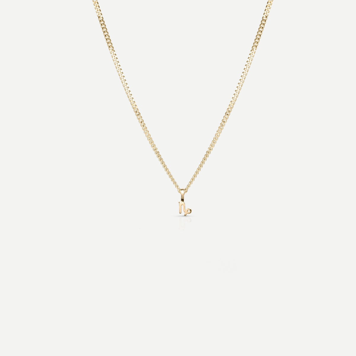 Solid gold and silver jewellery: A single Kate & Kole hand finished zodiac necklace in 9ct yellow gold