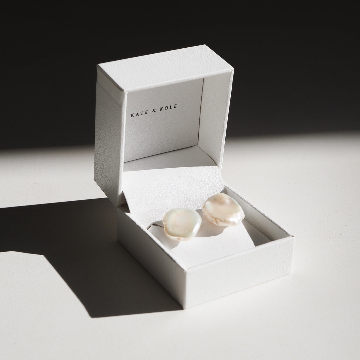High quality hand made jewellery: our beautiful large baroque pearl studs in 9ct yellow gold sitting perfectly in our Kate & Kole jewellery box