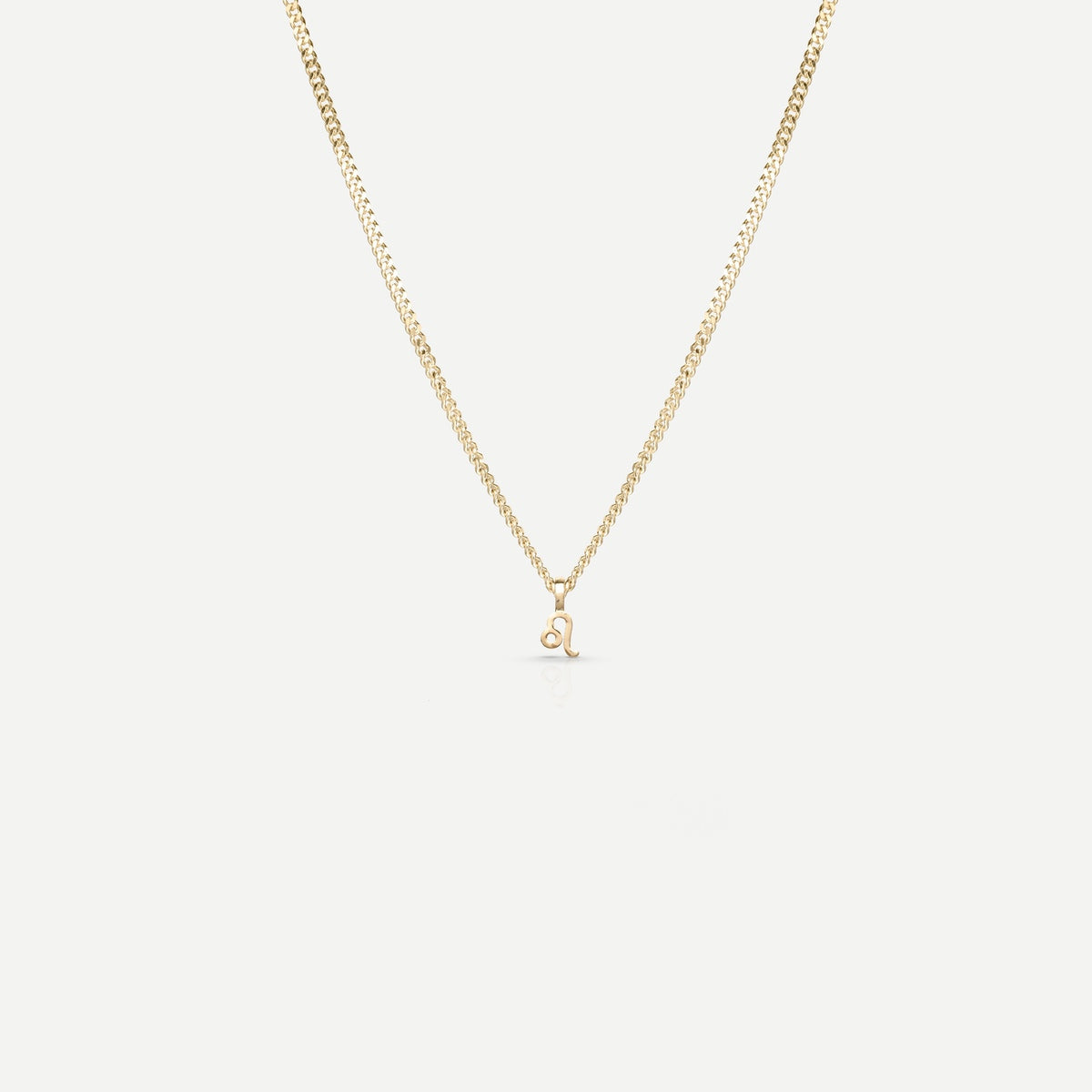 Solid gold and silver jewellery: A single Kate & Kole hand finished zodiac necklace in 9ct yellow gold
