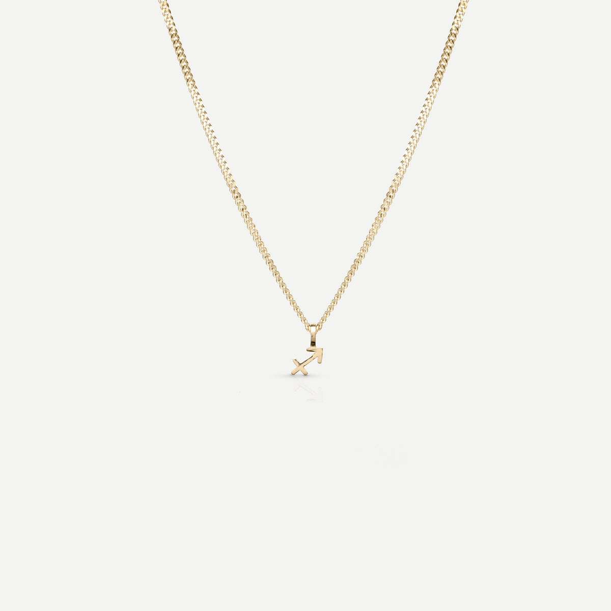 Solid gold and silver jewellery: A single Kate & Kole hand finished zodiac necklace in 9ct yellow gold